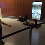 Smithsonian visitor trying Zugara Virtual Dressing Room technology